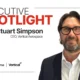 Portrait of Stuart Simpson CEO of Vertical Aerospace on a white banner with the words Executive Spotlight and company logos in the corner right side