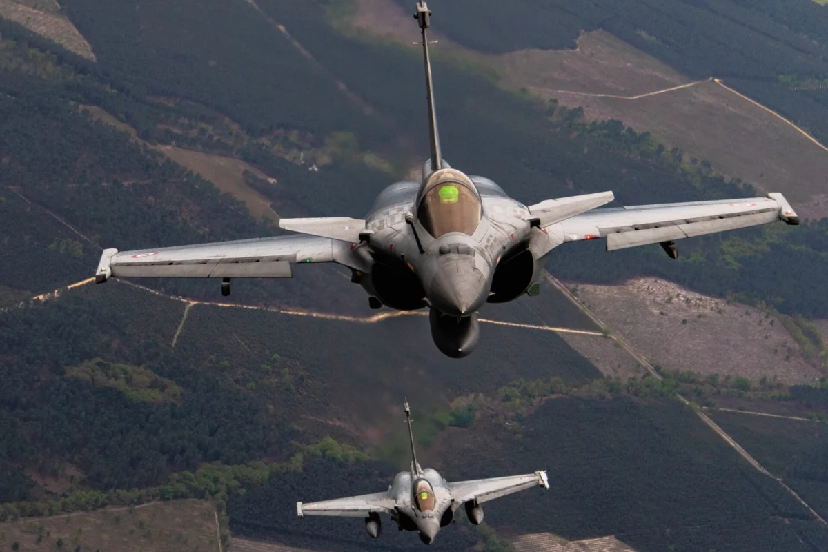 Two Rafale fighter jets flying in formation above France