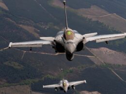 Two Rafale fighter jets flying in formation above France