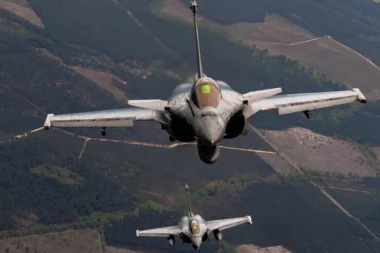 Two Rafale fighter jets flying in formation above France