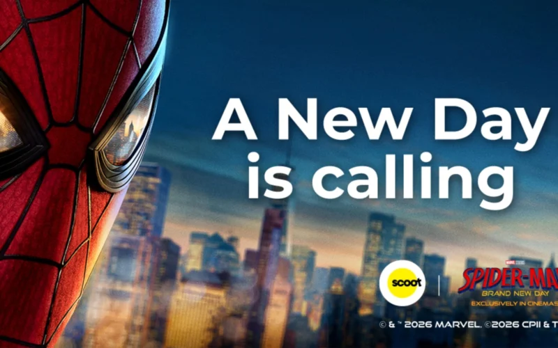 Spider Man close up on the left with a city skyline and bold white text reading A New Day is calling on a blue backdrop