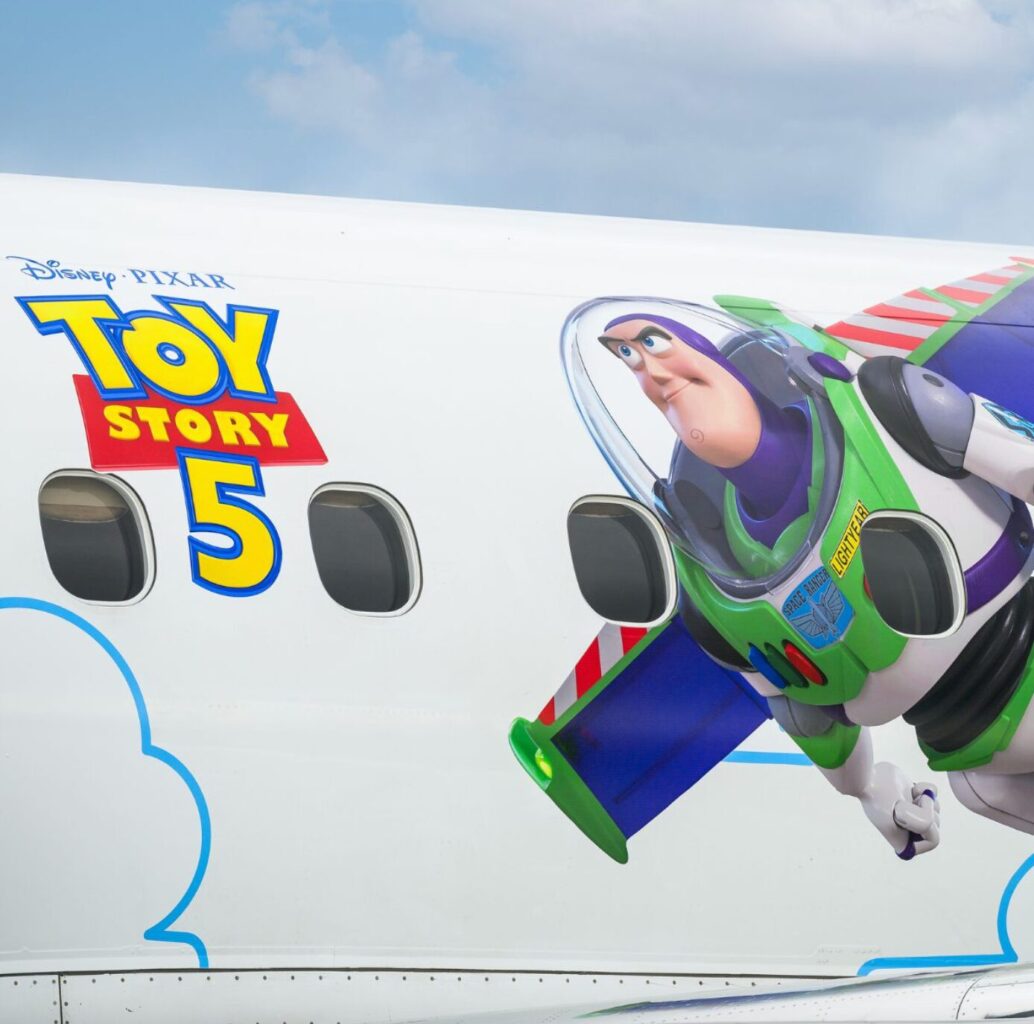 image Airplane fuselage with Toy Story 5 logo and a Buzz Lightyear illustration in green and purple