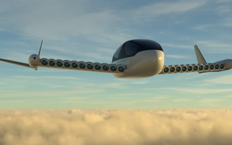 Futuristic jet with dozens of engine pods along its swept wings flying above clouds at sunset