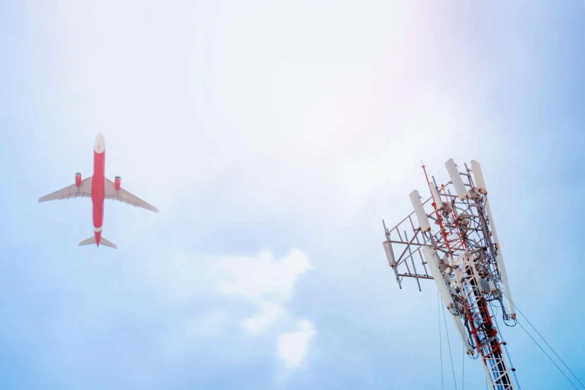 5G post and plane on sky background 5G post and plane on sky background