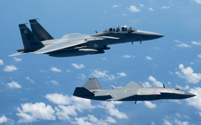 An MQ 28 Ghost Bat and US Air Force F 15EX Eagle II participated in Exercise Valiant Shield 2026