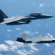 An MQ 28 Ghost Bat and US Air Force F 15EX Eagle II participated in Exercise Valiant Shield 2026