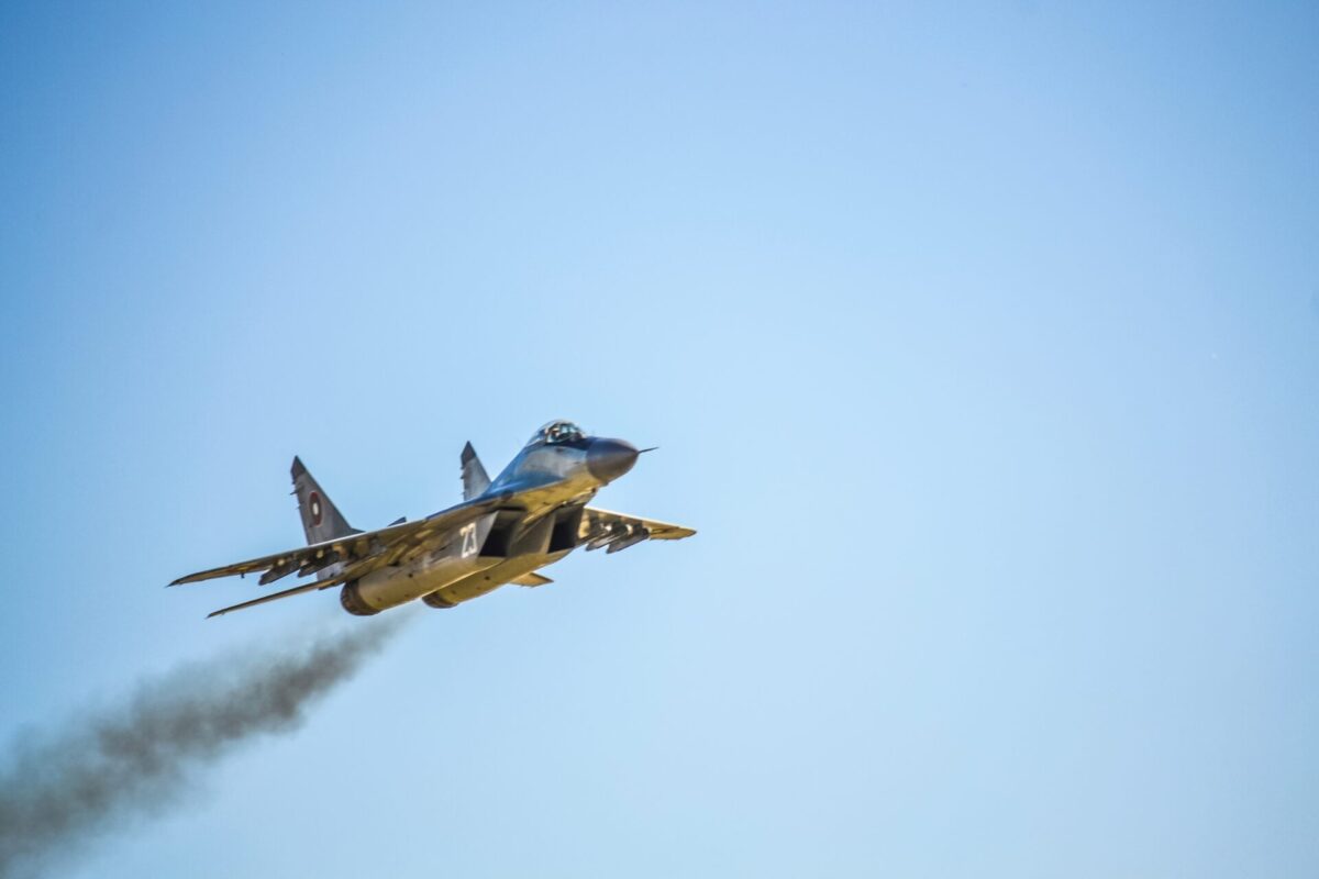 Bulgarian Air Force MiG 29 fighter jet Bulgarian Air Force MiG 29 fighter jet climbing against a blue sky