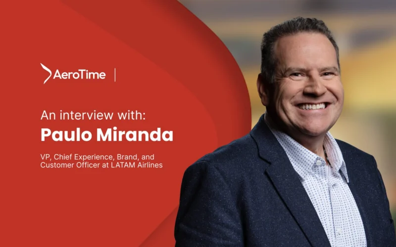 AeroTime interview banner featuring the subject LATAM Airlines VP smiling man in a dark suit on the right against a red background