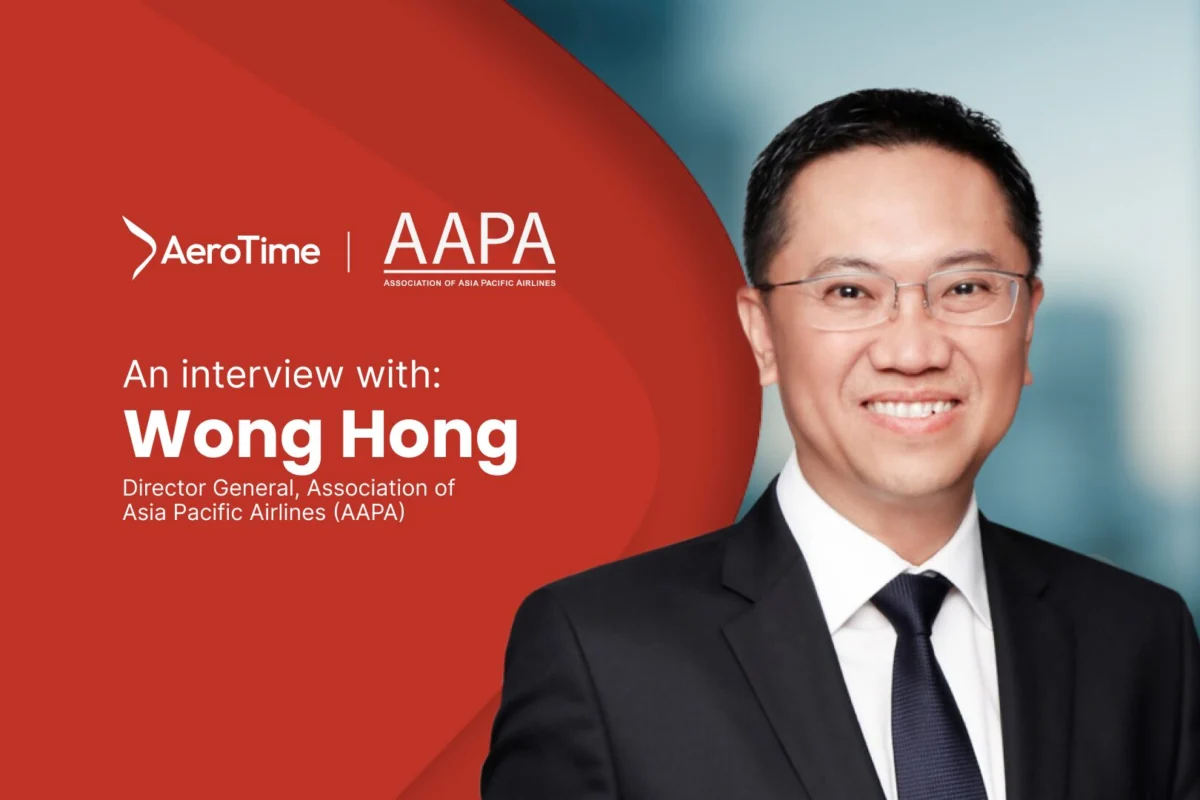Interview 1620x1080 Wong Hong Portrait of Wong Hong Director General of AAPA with the interview title and logos on a red background