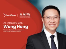 Portrait of Wong Hong Director General of AAPA with the interview title and logos on a red background