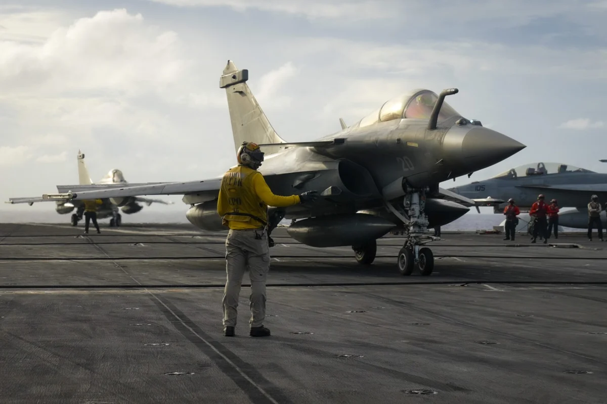 French Rafale Marine fighter jet on the flight deck of the Nimitz class aircraft carrier USS Carl Vinson French Rafale Marine fighter jet on the flight deck of the Nimitz class aircraft carrier USS Carl Vinson