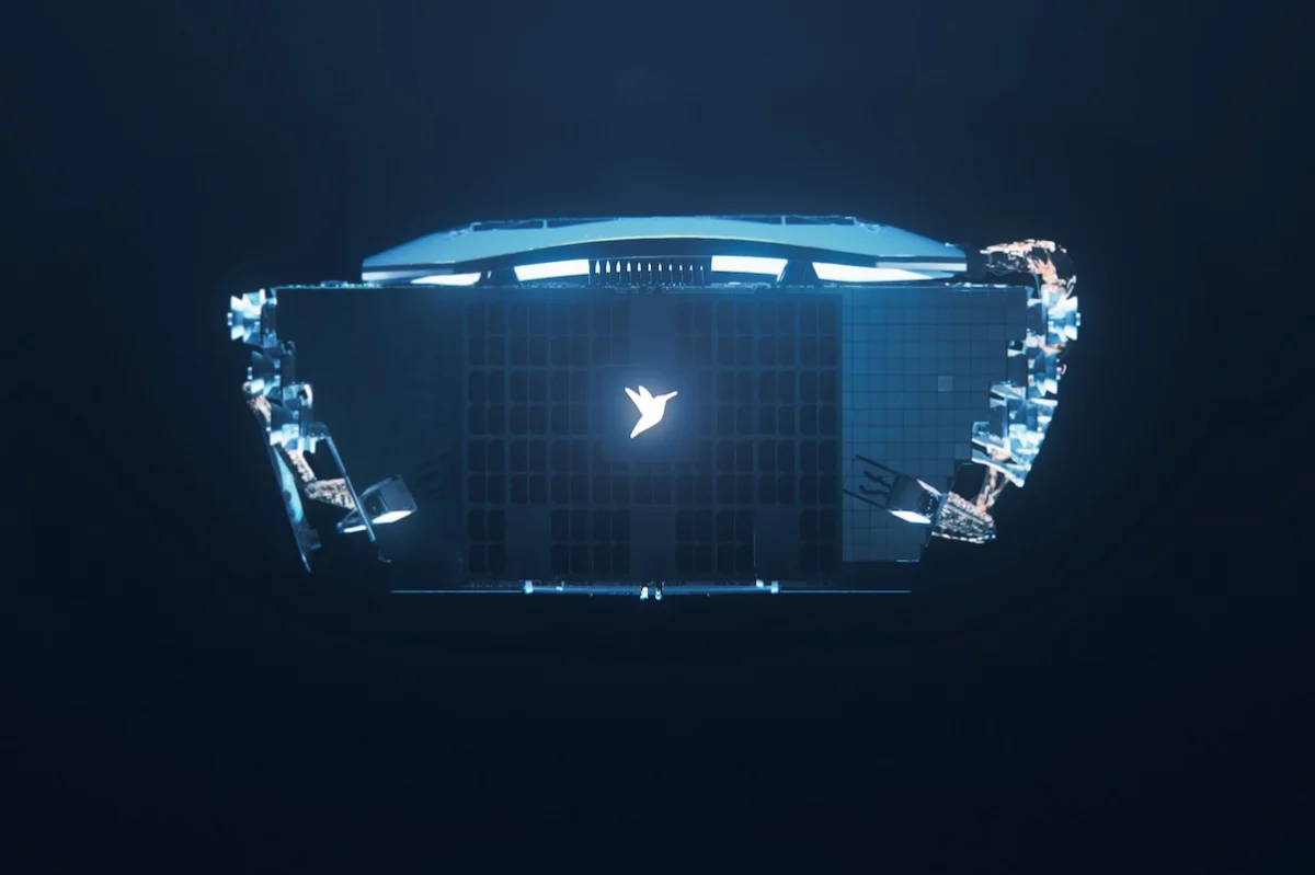 SWISSto12 SeriesC Top down view of a laptop floating in dark space glowing blue with a white bird logo at the center of the keyboard