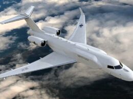 White military jet with South Korean markings in flight above clouds viewed from above