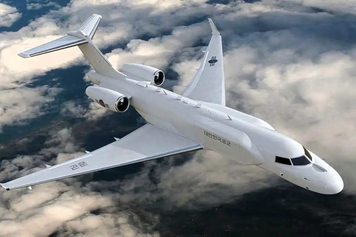 White military jet with South Korean markings in flight above clouds viewed from above