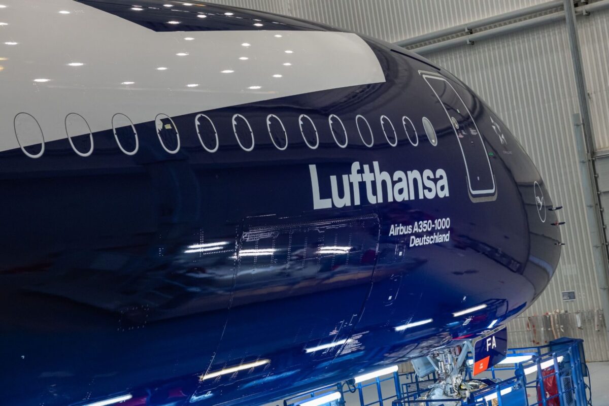 image Lufthansa Airbus A350 1000 in a hangar with blue fuselage and white Lufthansa lettering along the side