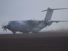 A Royal Air Force Airbus A400M Atlas arrives at Jan Mayensfield Norway carrying US Marines Royal Marines and two JTLVs for Operation Atlantic City 26