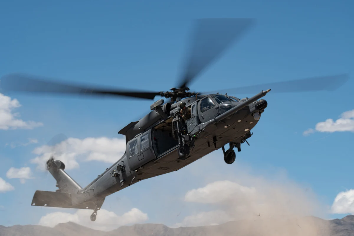 A US Air Force HH 60W Jolly Green II assigned to the 88th Test and Evaluation Squadron flies over Nellis Air Force Base