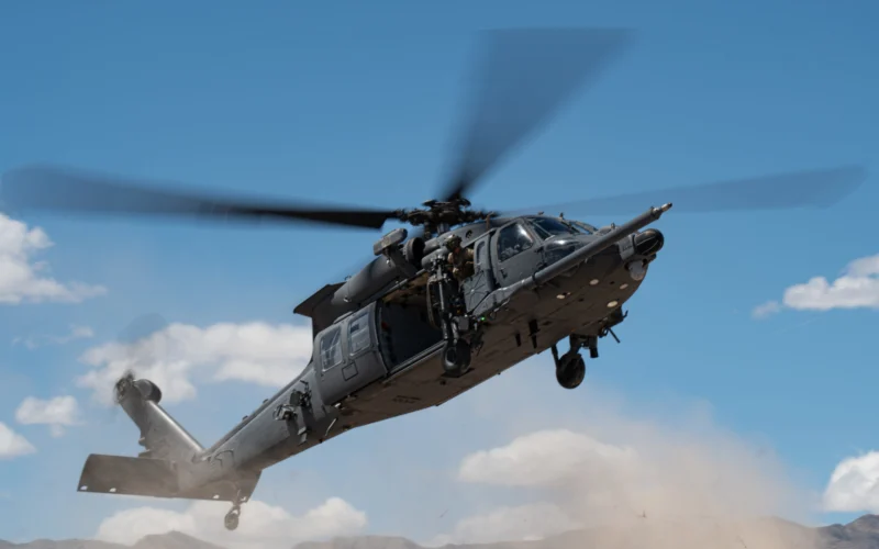 A US Air Force HH 60W Jolly Green II assigned to the 88th Test and Evaluation Squadron flies over Nellis Air Force Base
