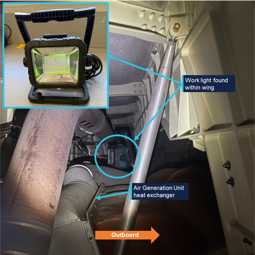 A maintenance work light found inside the left wing of Qantas Airbus A380 VH OQK Aircraft wing area showing the Air Generation Unit heat exchanger with a portable work light nearby