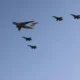 Algerian Air Force Su 30 fighters flying alongside an Il 78 tanker over Niger