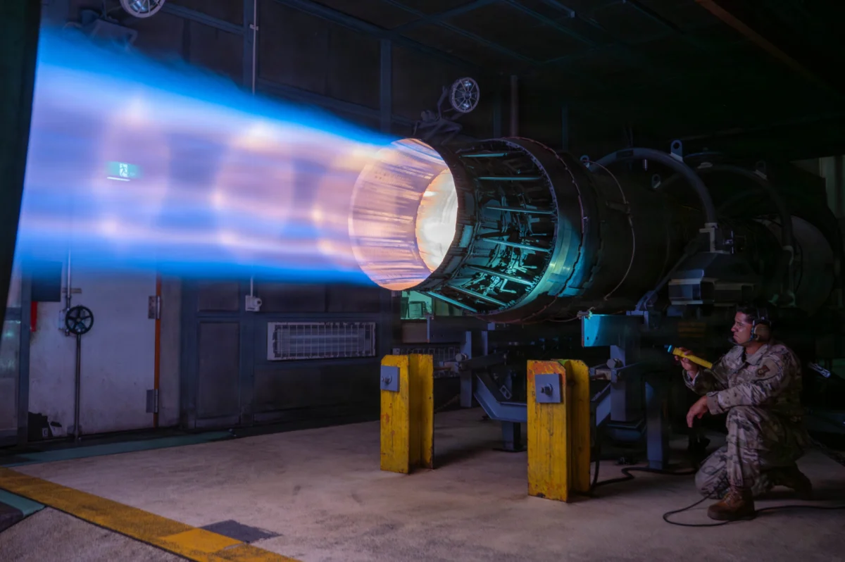 An F 15E Strike Eagle engine the F100 PW 220 goes through a routine afterburner test An F 15E Strike Eagle engine the F100 PW 220 goes through a routine afterburner test
