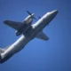An Indian Air Force Antonov An 32 transport aircraft performs at an air show in Rajkot India