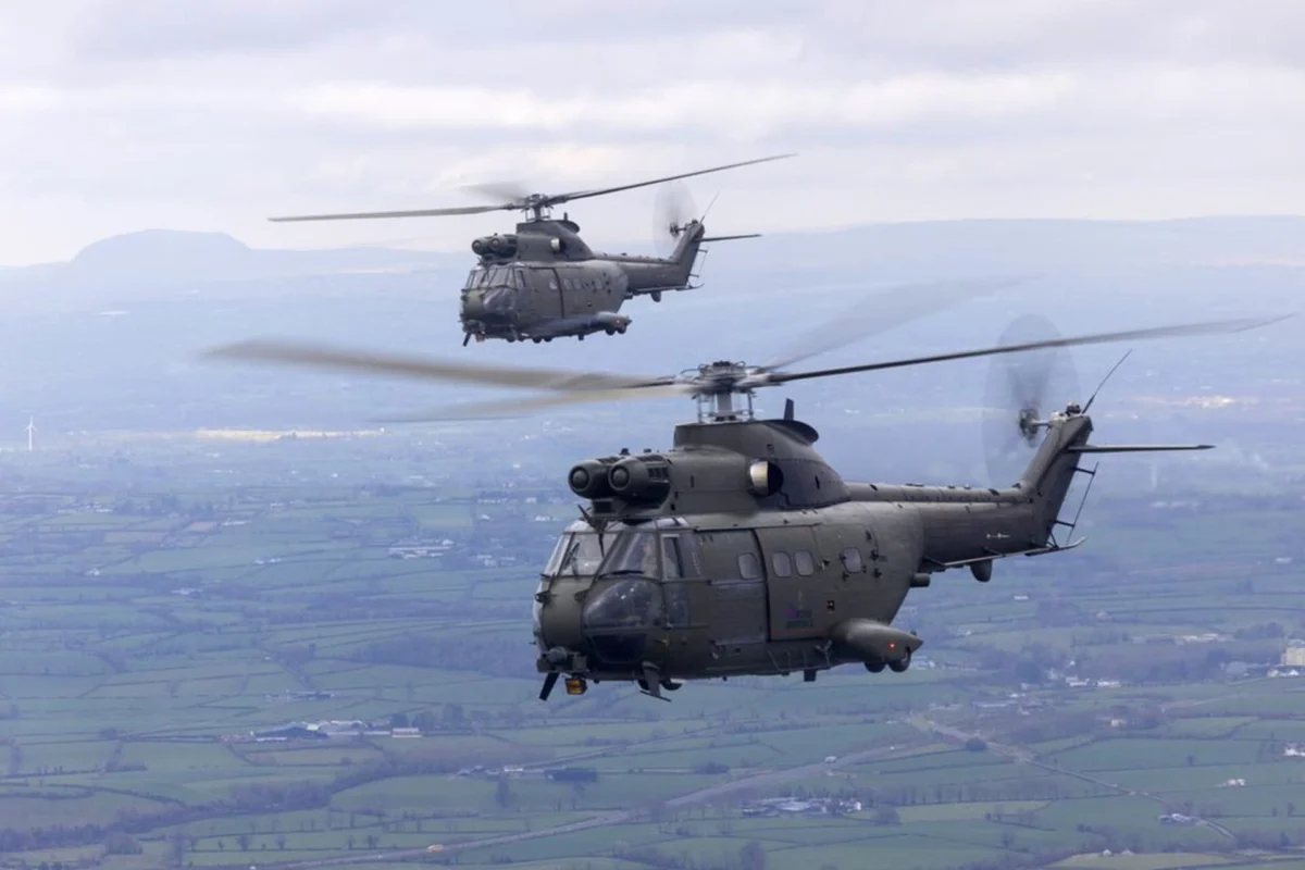 Two Royal Air Force Puma HC2 helicopters conduct the types final UK flypast on March 26 2025 Two Royal Air Force Puma HC2 helicopters conduct the types final UK flypast on March 26 2025