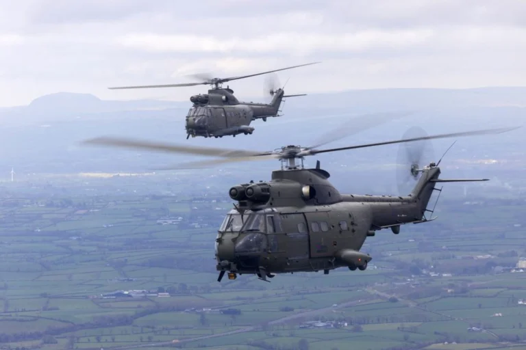 Two Royal Air Force Puma HC2 helicopters conduct the types final UK flypast on March 26 2025