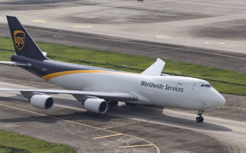 UPS Hong Kong hub 1 UPS Boeing 747 cargo plane on the taxiway with Worldwide Services branding on the fuselage