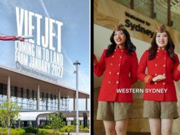 Airline advert a red Vietjet jet flying past a large sign announcing landing in Western SydneyJanuary 2027 at the airport
