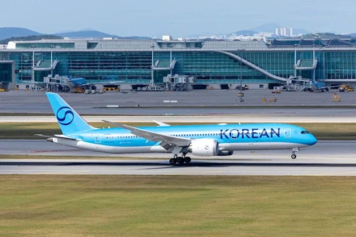Korean Air launches seasonal Seoul Melbourne flights Blue Korean Air passenger jet on the taxiway with a modern glass terminal building in the background