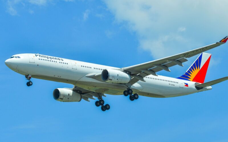PAL to boost Manila Melbourne to daily flights from November Philippine Airlines wide body airliner in the sky with landing gear extended against a blue backdrop tailfin visible with colorful logo