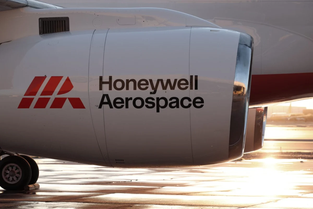 ha Close up of a jet engine nacelle bearing the Honeywell Aerospace logo