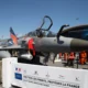 A DGA Mirage 2000 test aircraft equipped with a Thales TALIOS targeting pod on static display