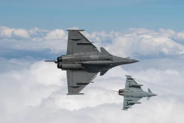 A Dassault Rafale and a Eurofighter Typhoon fly in formation