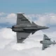 A Dassault Rafale and a Eurofighter Typhoon fly in formation