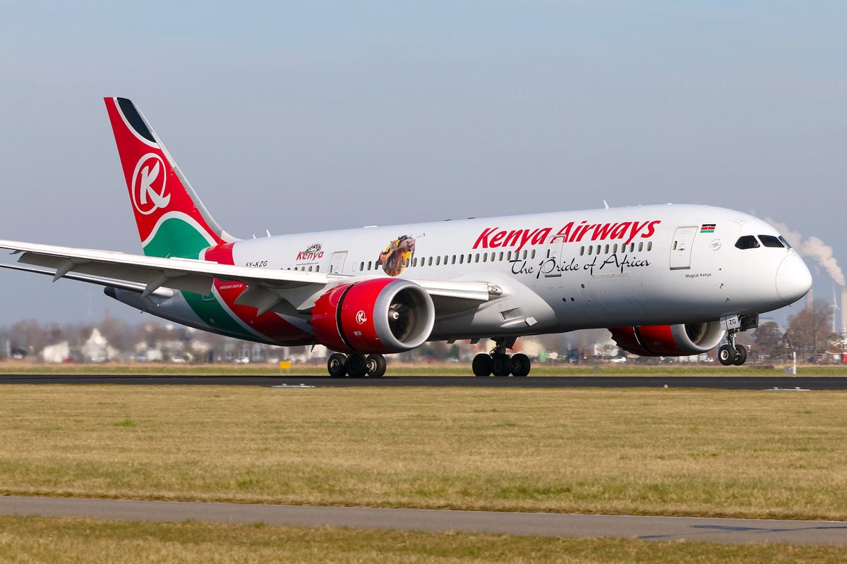 AmsterdamNetherland February232019 KenyaAirwaysBoeing Kenya Airways jet on the runway with red green and white livery Kenya Airways and The Pride of Africa visible on the fuselage