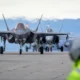 A Royal Danish Air Force F 35A alongside a Royal Canadian Air Force CF 18 at Kangerlussuaq Airport Greenland