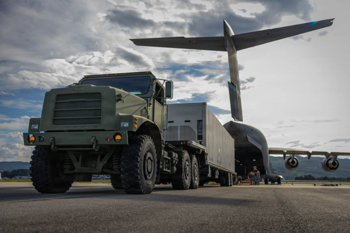 A US Air Force C 17A Globemaster III delivers a US Navy Containerized Launching System to Trondheim Norway
