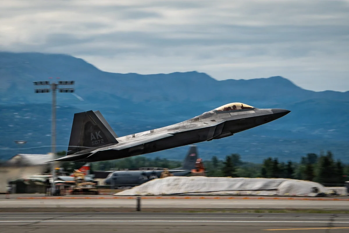 A US Air Force F 22 Raptor assigned to the 90th Fighter Squadron takes off