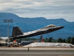 A US Air Force F 22 Raptor assigned to the 90th Fighter Squadron takes off