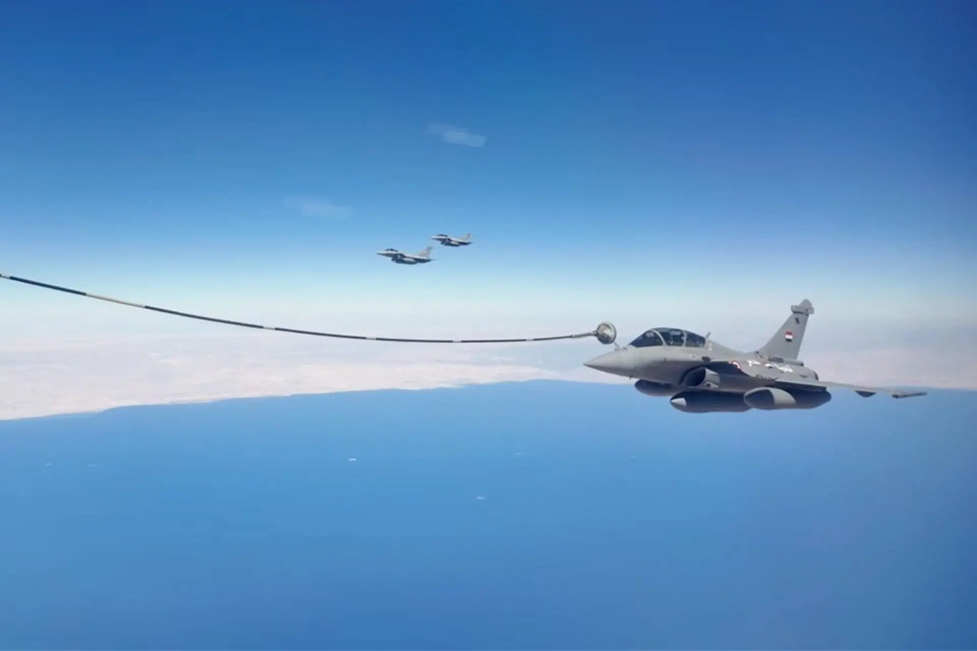 An Egyptian Air Force Dassault Rafale approaches the refueling drogue of a PLAAF YY 20 tanker during the Eagles of Civilization 2026 exercise