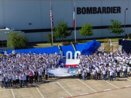 Bombardier employees celebrate the completion of the 100th Global 7500 wing at the companys Red Oak Texas facility in 2021