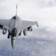 French Air Force Dassault Rafale fighter jet in flight equipped with AASM Mica IR missiles and a Damocles pod during Operation Harmattan