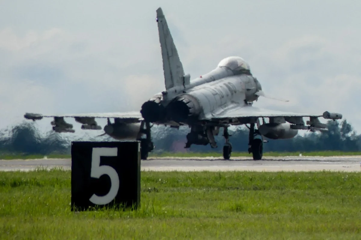Italian Air Force Eurofighter Typhoon takes off from Šiauliai Air Base during a NATO Baltic Air Policing Italian Air Force Eurofighter Typhoon takes off from Šiauliai Air Base during a NATO Baltic Air Policing