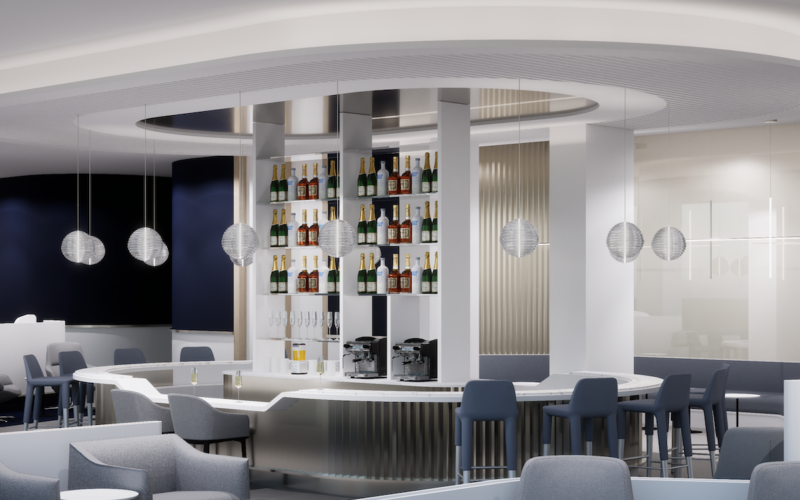 MARKS AF BAR 1920x1080 Modern circular bar with backlit shelves displaying bottles surrounded by grey seating in a sleek lounge