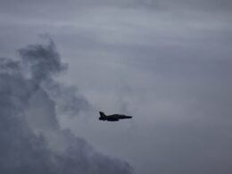 RAF BAE Systems Hawk T2 advanced jet training aircraft against moody grey clouds and sky