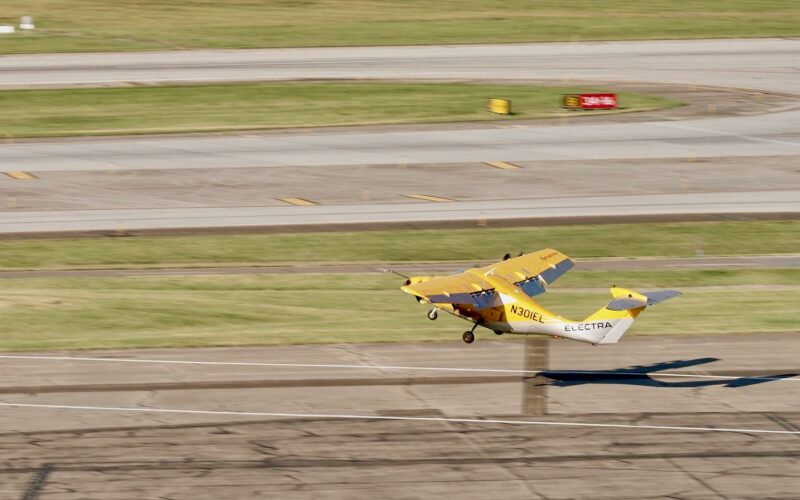 Recently Saved 1 of 1 13 Small yellow biplane lifting off the runway tail marked ELECTRA and registration N301EL