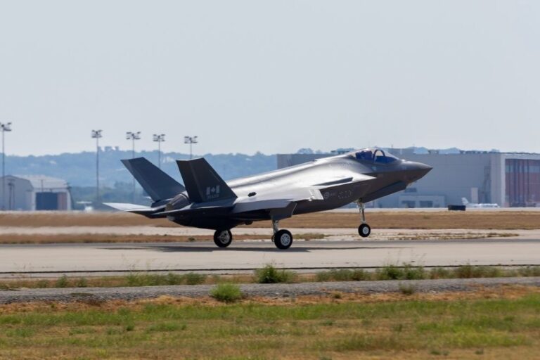 Recently Saved 1 of 1 16 F 22 Raptor stealth fighter on a runway with landing gear down preparing for takeoff at an airbase