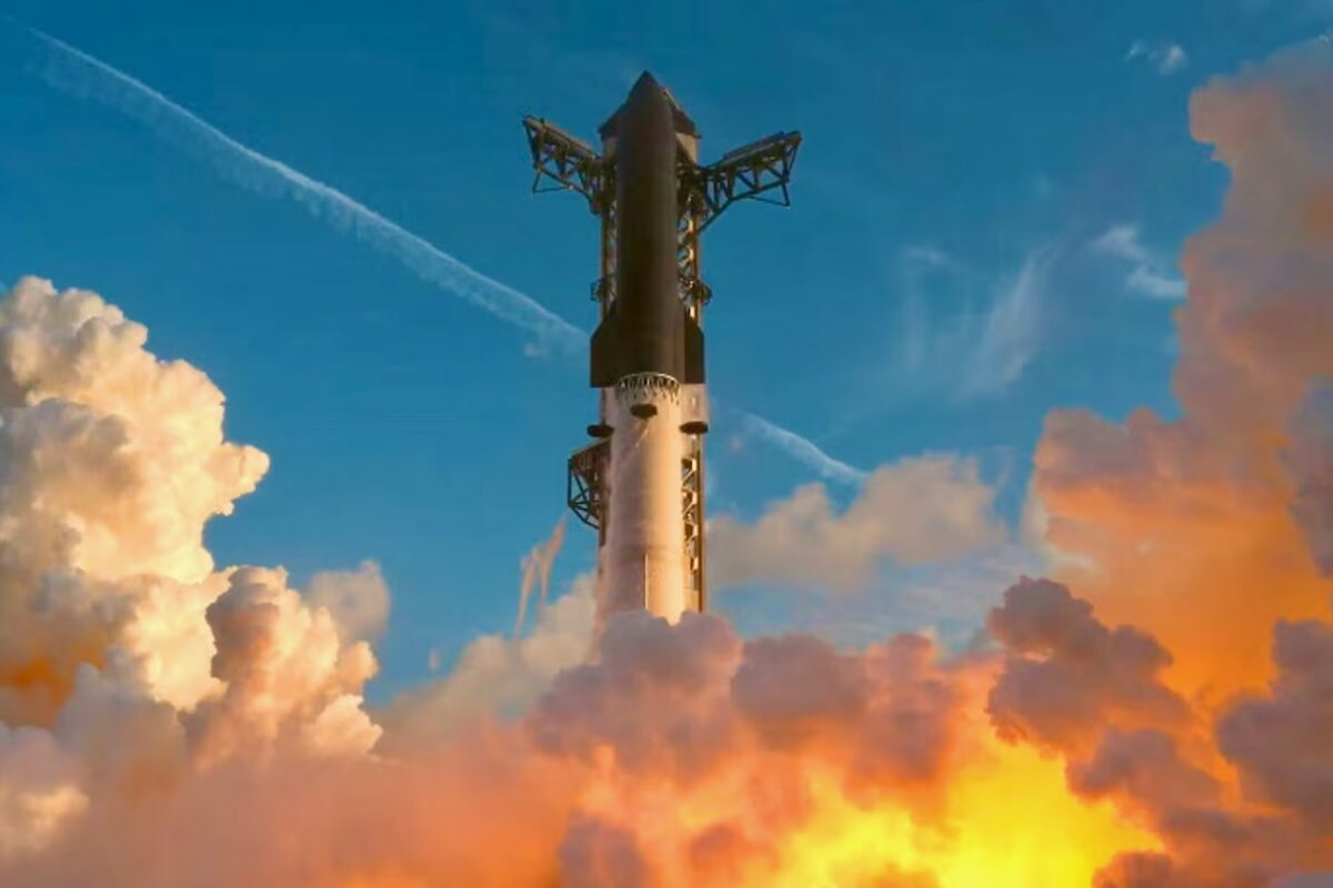 Recently Saved 1 of 1 20 Rocket lifting off through a plume of orange and yellow flames and smoke rising into a blue sky with clouds around it